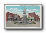 Click to enlarge Arrow Head Monument to First Settlers of Old Fort NC (card has no APC number, but has CT number) (with cars)