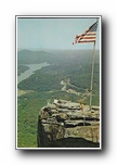 Click to enlarge Looking over the top of Chimney Rock, showing Lake Lure in the distance, as seen from the Opera Box at Chimney Rock park, Chimney Rock, North Carolina