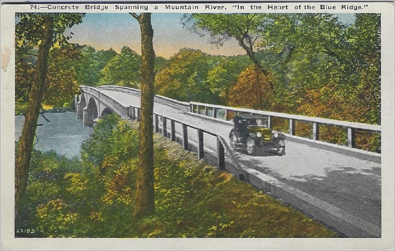 Concrete Bridge Spanning a Mountain River 