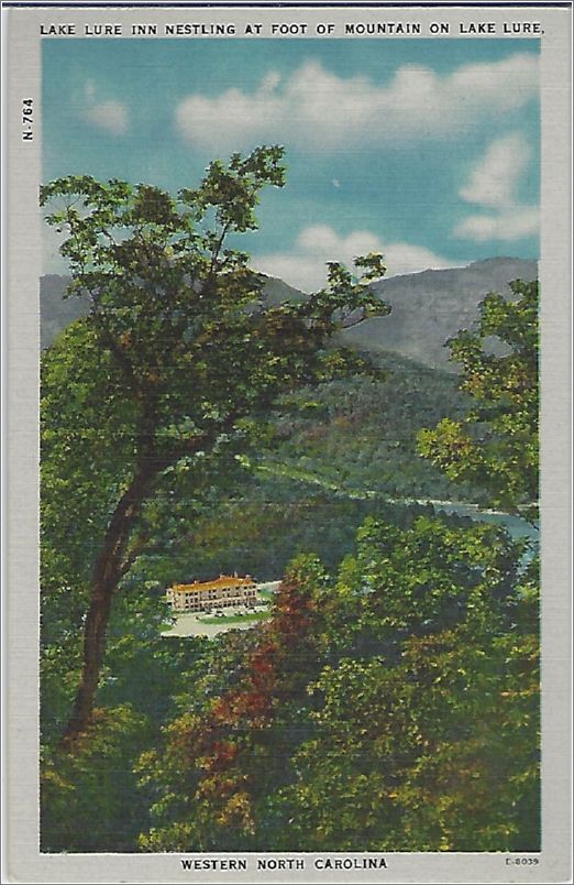 Lake Lure Inn nestling at foot of mountain on Lake Lure, Western North Carolina x19-apcn764a01-f