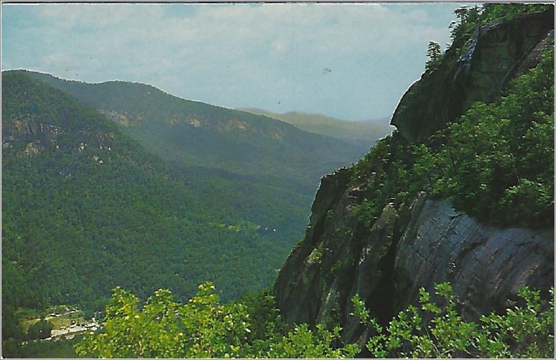 The Cliffs of Chimney Rock Mountain see from the head of Hickory Nut Falls. x19-ckcl023a01-f